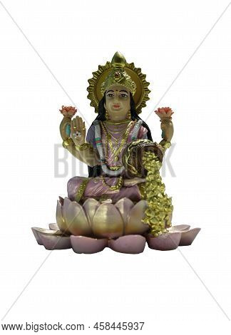 Hindu Cosmos Maha Laxshmi Statue Decorated With Flower Garland Isolated On White Background With Cli
