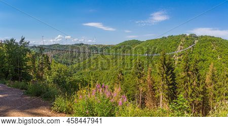 Moersdorf, Germany: August, 1. 2020: Geierlay Suspension Rope Bridge, A Pedestrian Rope Bridge Betwe