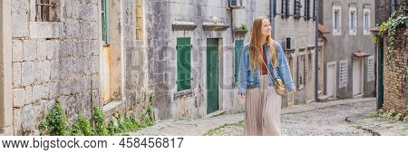 Banner, Long Format Woman Tourist On Background Of Scenic Panorama View Of The Historic Town Of Risa
