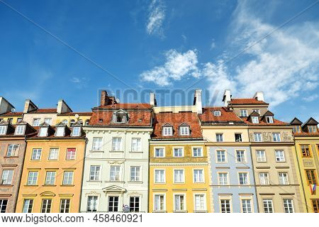 Colourful Buildings Of Warsaw's Old Town Market Square, Which Was Completely Destroyed During The Wo