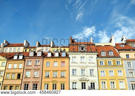 Colourful Buildings Of Warsaw's Old Town Market Square, Which Was Completely Destroyed During The Wo