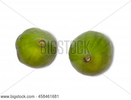 Green Fresh Figs On A White Background. Fig Fruit On A Cutting Board. Healthy Diet. The Fruit Of A S