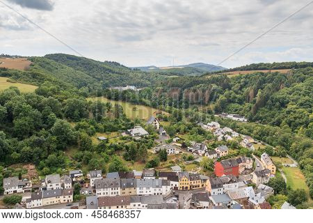 Panorama View On Eifel Landscape And Village Monreal With Half-timber Houses , Germany