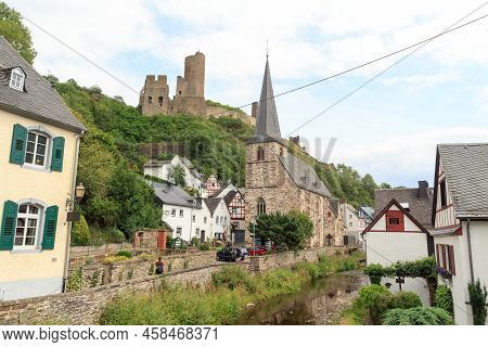 Panorama With Ruins Of The Castle Loewenburg On A Hill Spur Above Eifel Village Of Monreal With Half