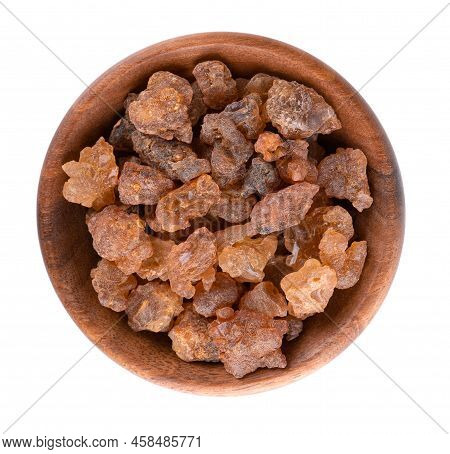 Myrrh Resin In Wooden Bowl, Isolated On White Background. Pile Of Natural Commiphora Myrrha. Sweet M