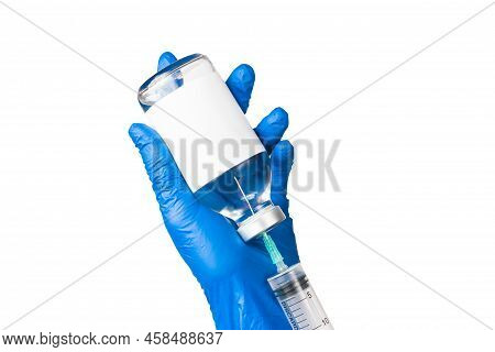 The Process Of Drawing The Drug Into A Syringe. Syringe In The Hands Of A Doctor.