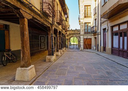 Arcades Of Medieval Buildings In The Alley Of Access To The Main Square Of The Town, San Esteban De 