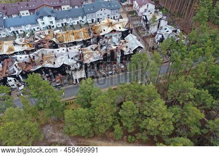 Top View Of The Destroyed And Burnt Houses. Houses Were Destroyed By Rockets Or Mines From Russian S