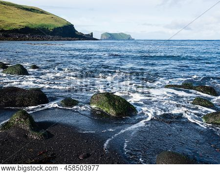 Waves Rolling Over Black Volcanic Sand On Klauf Beach, Heimaey Island - Westman Islands, Iceland