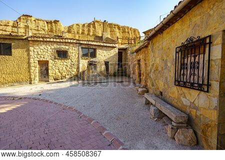 Old Houses Built Next To The Rocks Of The Mountains In San Esteban De Gormaz, Spain.