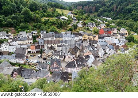 Panorama View On Eifel Village Monreal With Half-timber Houses And River Elsbach, Germany