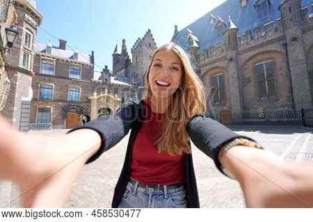 Self Portrait Of Student Girl In The Courtyard Of The Binnenhof Complex Of Buildings In The Hague, N
