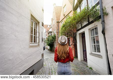 Beautiful Traveler Woman In Schnoor Neighborhood, Bremen, Germany