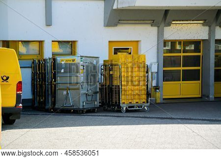 Oberkirch, Germany - May 27, 2022: Deutsche Post Yellow And Aluminum Delivery Boxes Sorting Equipmen