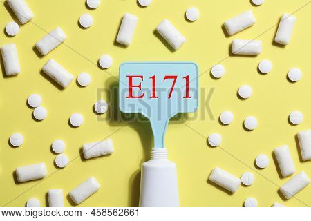 Titanium Dioxide, E171, Dangerous Additive Concept. Gum, Pills, Toothpaste Or Cream And Sign With E1