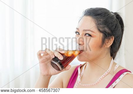 Portrait Beautiful Plump Young Asian Woman Joy Of Eating Drinking Cola , Sweet Water , Sparkling Wat