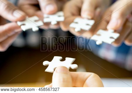 Close Up Hand Of Group Business Partnership People Puting Together A Jigsaw Puzzle  , Business Teamw