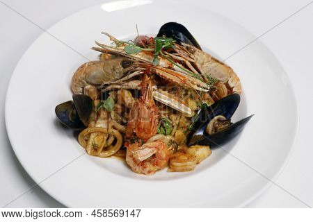 Seafood Linguine Pasta With Langostino, Octopus, Squid Rings, Shrimps, Mussels, Scampi And Clams In 