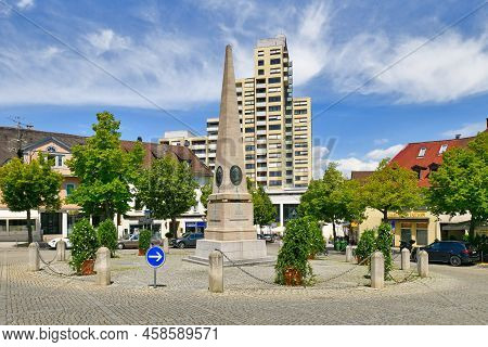 Ludwigsburg, Germany - July 2022: Small Town Square Called 'holzmarkt' With Roundabout And Obelisk M