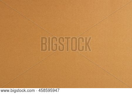 Craft Striped Corrugated Paper Texture Background. Recycling Material. Closeup Shot