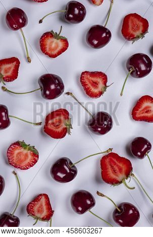 Vertical Background Of Ripe Strawberries And Cherries On A White Background.trendy, Fruity, Summerba