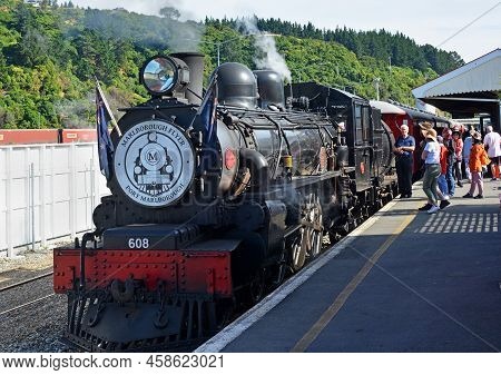 Picton, New Zealand - February 07, 2020: Passengers Board The Marlborough Flyer Tourist Steam Train 