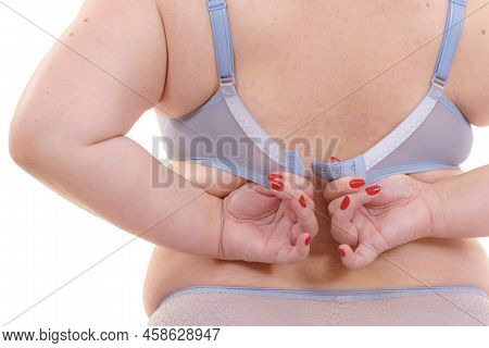 Woman Back View Putting On Her Bra Lingerie.