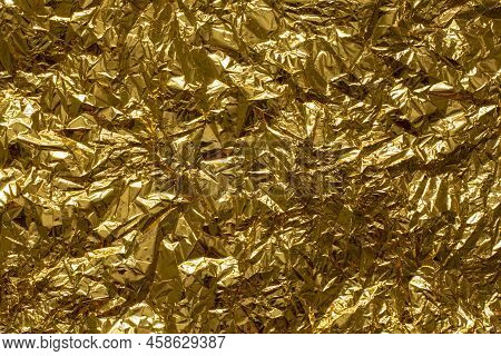 Crumpled Golden Tissue Closeup Backdrop Full Frame
