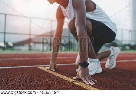 Hands Runner Ready Start To Run Athlete Sportman Training Run On Lane At The Stadium In Morning. Run