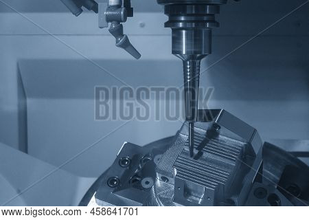 The 5-axis Cnc Milling Machine  Cutting The Metal Mold Part. The Hi-technology Injection Mold Part M