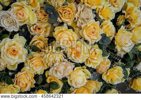 Big Bouquet Of Flowers In A Vase On A Gray Wall Background