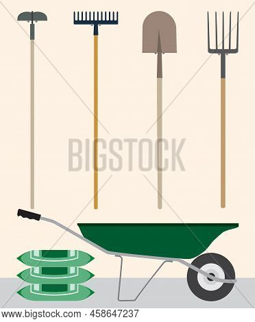 Several Different Tools Are Waiting To Be Used In A Yard Work Project