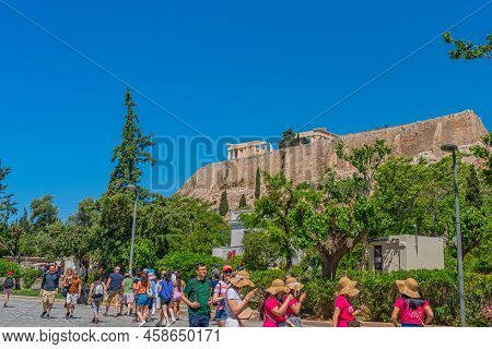 Athens, Greece - May 21, 2022: Street View In Plaka District Of Athens, Background Acropolis