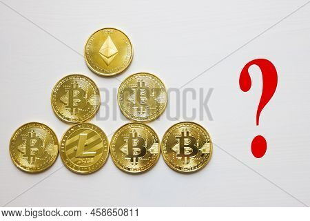 Сrypto Currency Conceptual Image. Is Bitcoin A Financial Pyramid? Golden Coins.