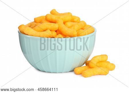 Many Tasty Cheesy Corn Puffs In Bowl Isolated On White