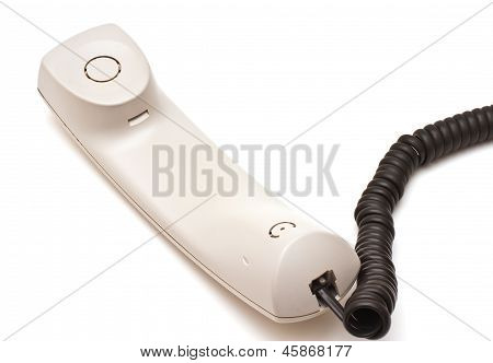 Cornetta del telefono e cavo su bianco