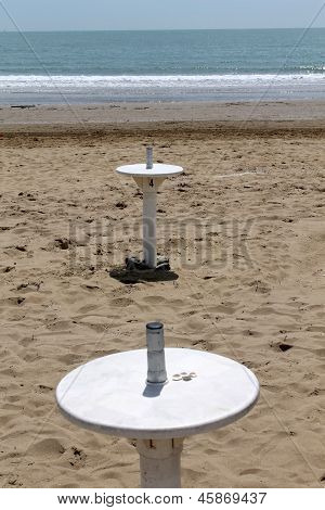 Umbrella Stand On The Beach