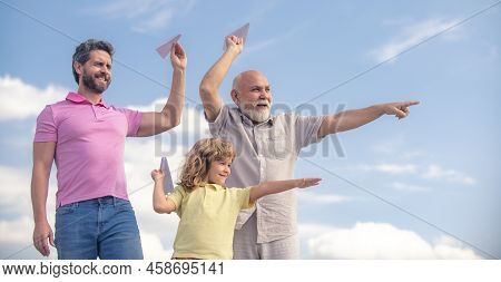 Fathers Day. Kid Having Fun With Toy Plane. Men Generation Family With Three Different Generations A
