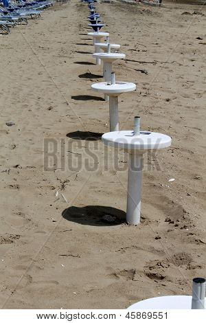 Umbrella Stand On The Beach