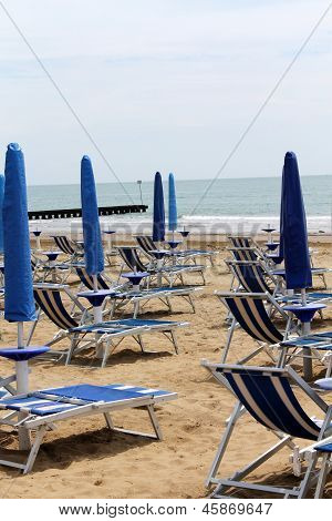 Deck Chairs On The Beach