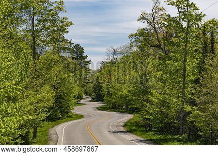 Highway 42 Curves Back And Forth As It Follows The Forest's Pathway Through The Woods, Door County, 
