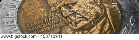 Translation: Republic Of Chile. Coin Of 500 Chilean Pesos Close-up. Peso Of Chile. News About Econom