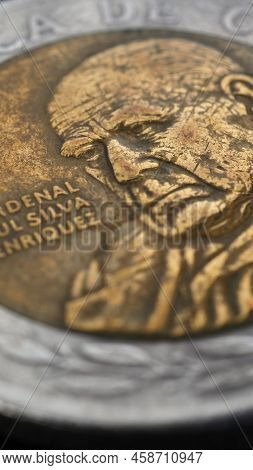 Translation: Republic Of Chile. Coin Of 500 Chilean Pesos Closeup. Peso Of Chile. News About Economy