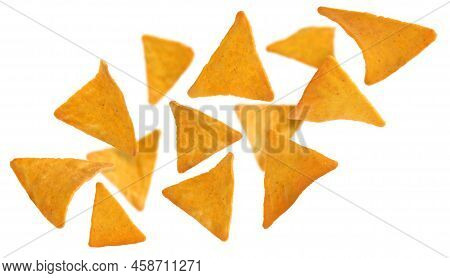 Tasty Tortilla Chips (nachos) Falling On White Background