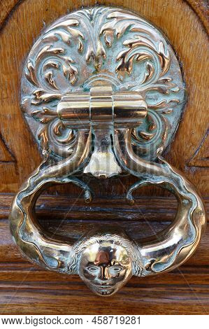 European Vintage Old Metal Wrought Iron Door Knocker. Design Detail. Paris.