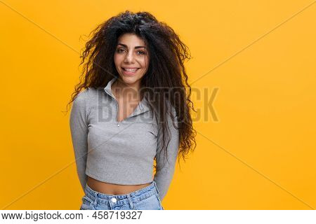 Close Up Young Happy Smiling Woman 20s With Culry Hair Wear Casual Clothes Isolated On Plain Yellow 