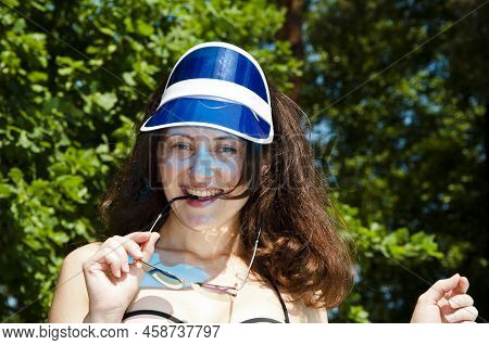 Happy Woman In Visor Hat. Summer Visor Cap Accessory. Girl Wearing Visor Hat.