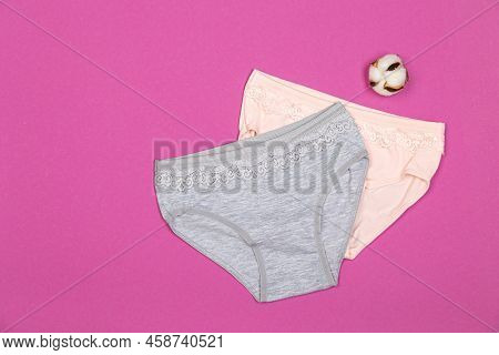 Clothes For Children In The Form Of Panties On A Pink Background. Clothes For Children From Soft Fab
