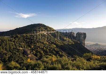 The Huge Rock Pillars Formation Of Meteora Over The Kalampaka Town, Beside The Pindos Mountains, Kal