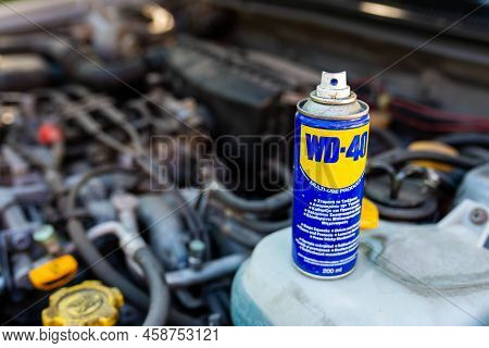 Miercurea Ciuc, Romania- 26 July 2022: Wd-40 Multi Purpose Penetrating Oil On Old Japanese Car Engin